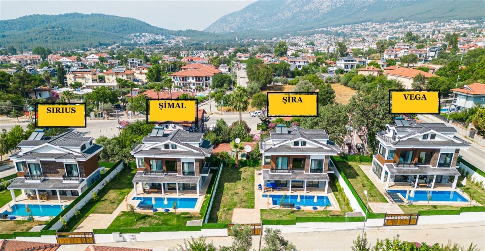 Siriya, Şimal ve Vega villalarını gösteren havadan çekilmiş toplu görünüm.